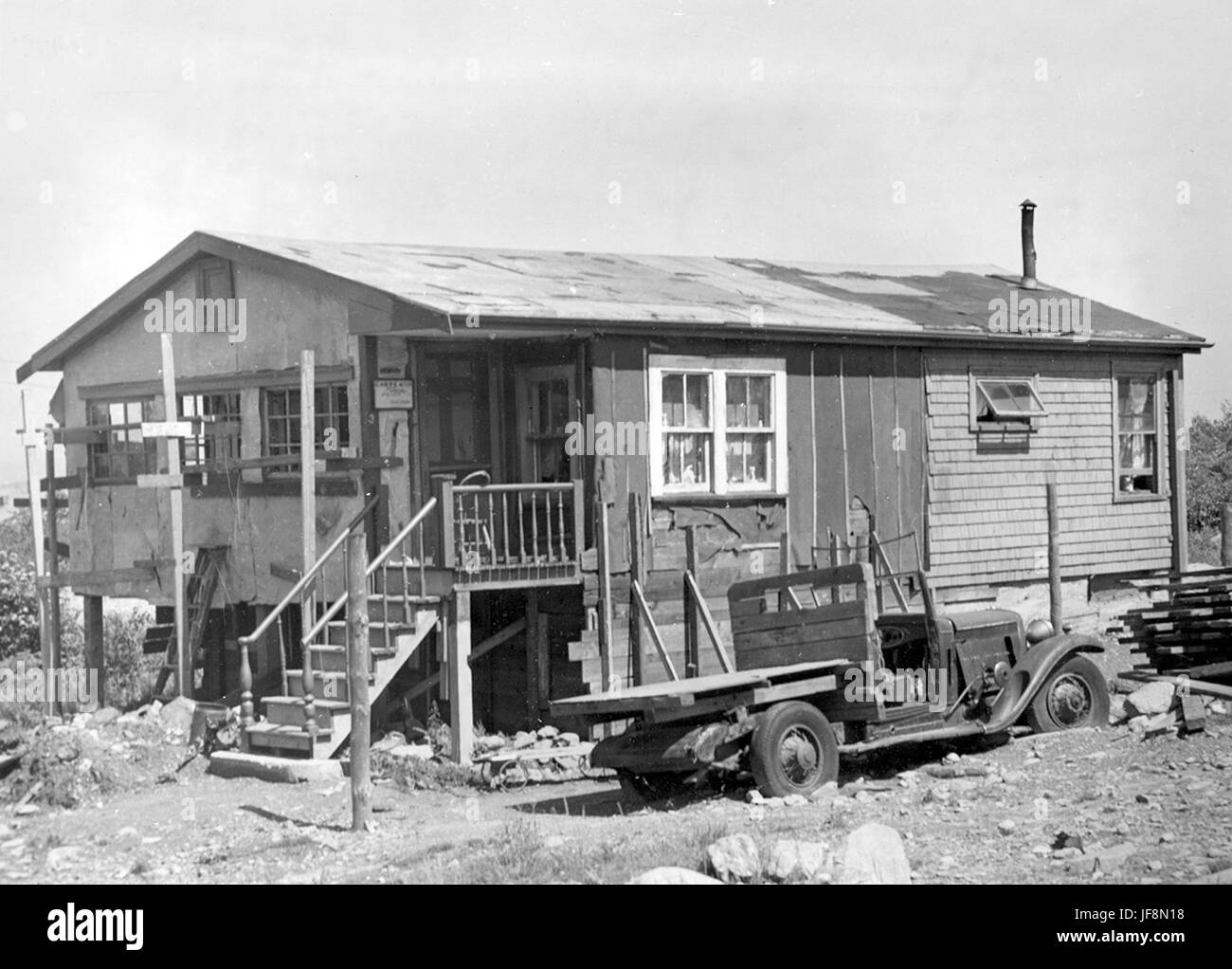 Una casa recante il numero 3 e un cartello - Una rappresentazione storica di una casa contrassegnata con il numero 3, significativa nel contesto delle comunità africane della nuova Scozia a Halifax, nuova Scozia. Foto Stock