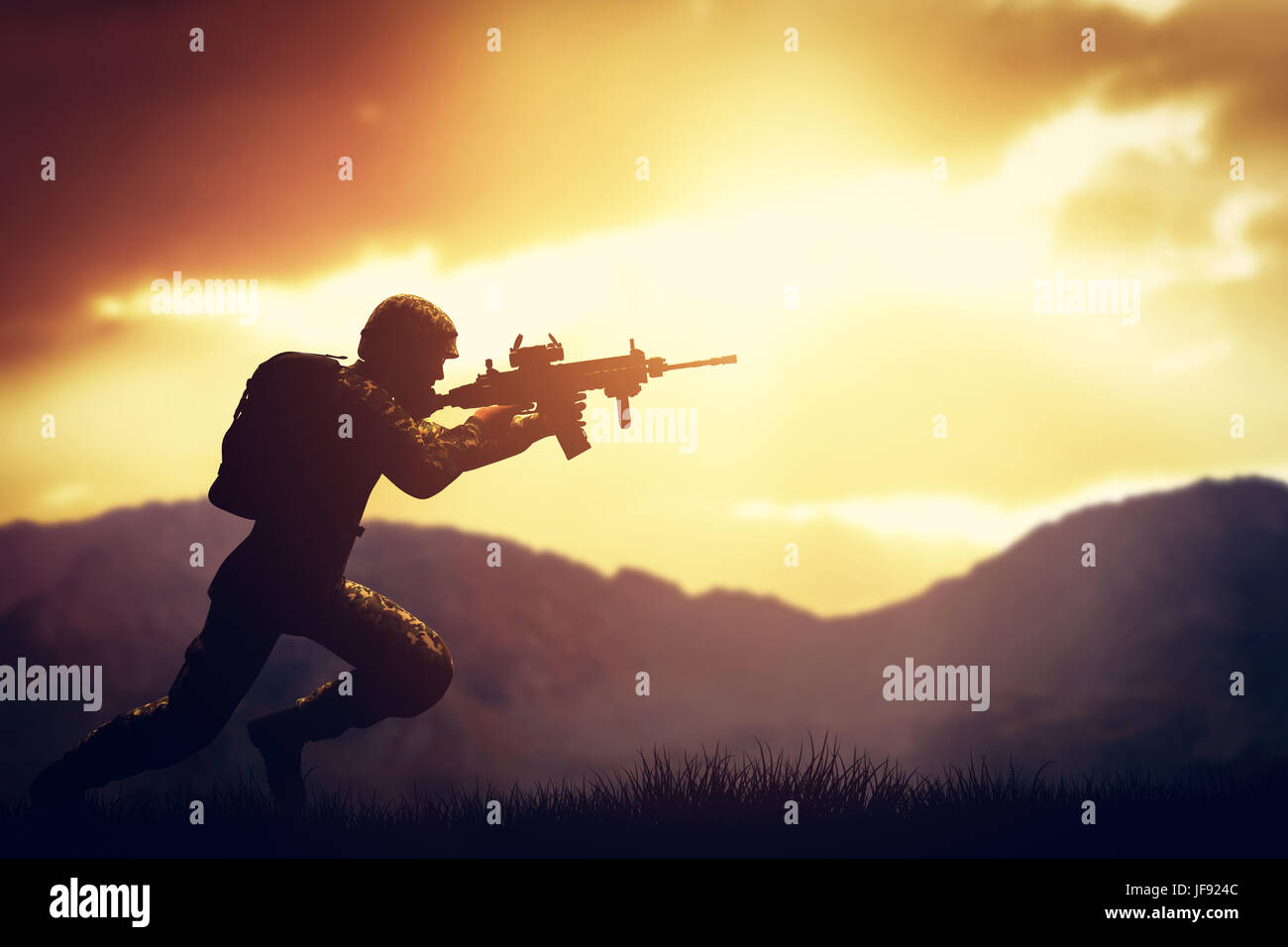 Soldato in combattimento a sparare con la sua arma, fucile al tramonto. La guerra, esercito, militare. Foto Stock