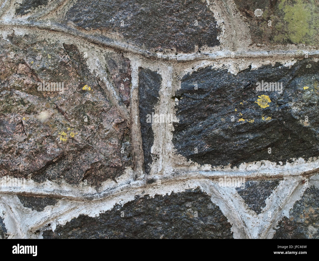 Muro di pietra sullo sfondo Foto Stock