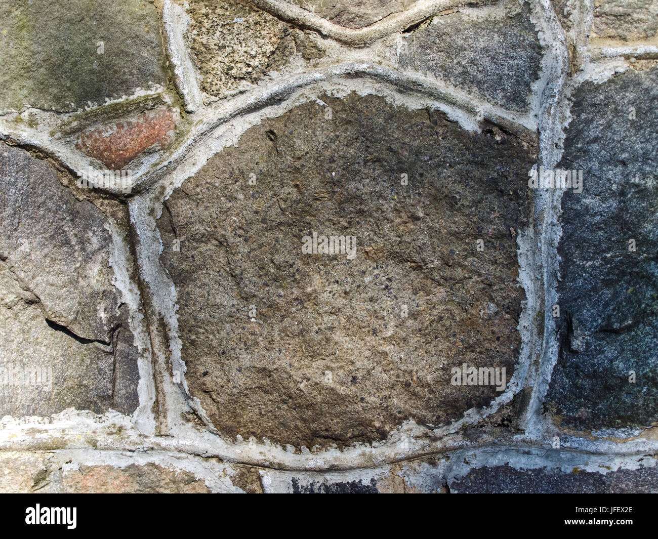 Muro di pietra sullo sfondo Foto Stock