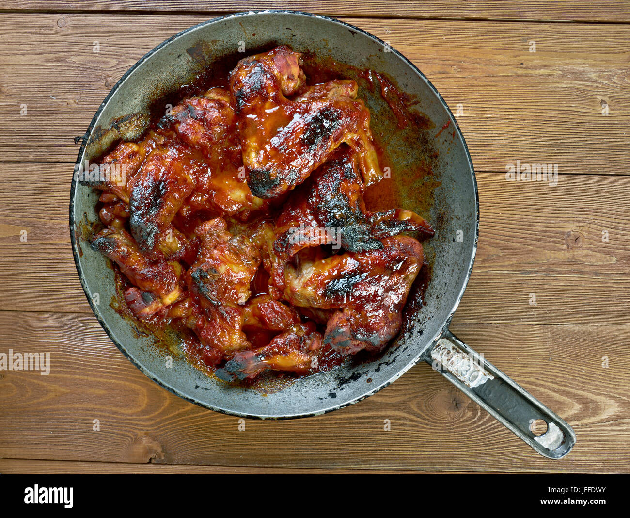 Italiano le ali di pollo in salsa Foto Stock