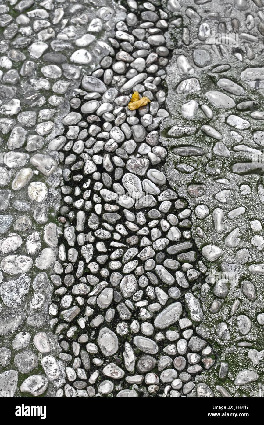 Vecchia strada lastricata di pietre Foto Stock