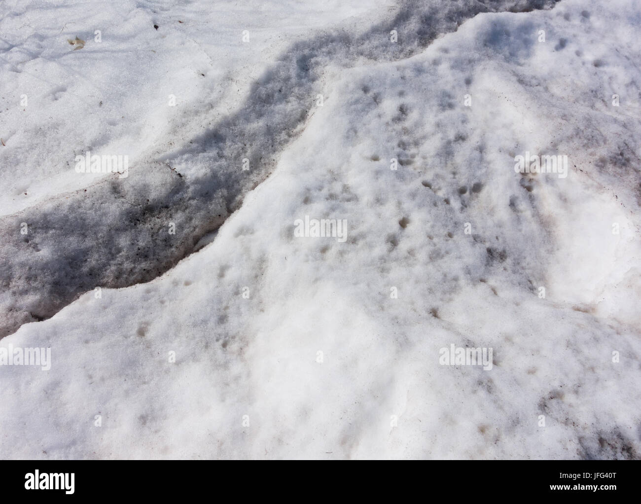 neve sporca Foto Stock