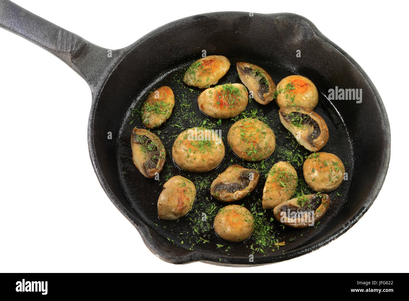 Sauté di funghi bianco in casted pan Foto Stock