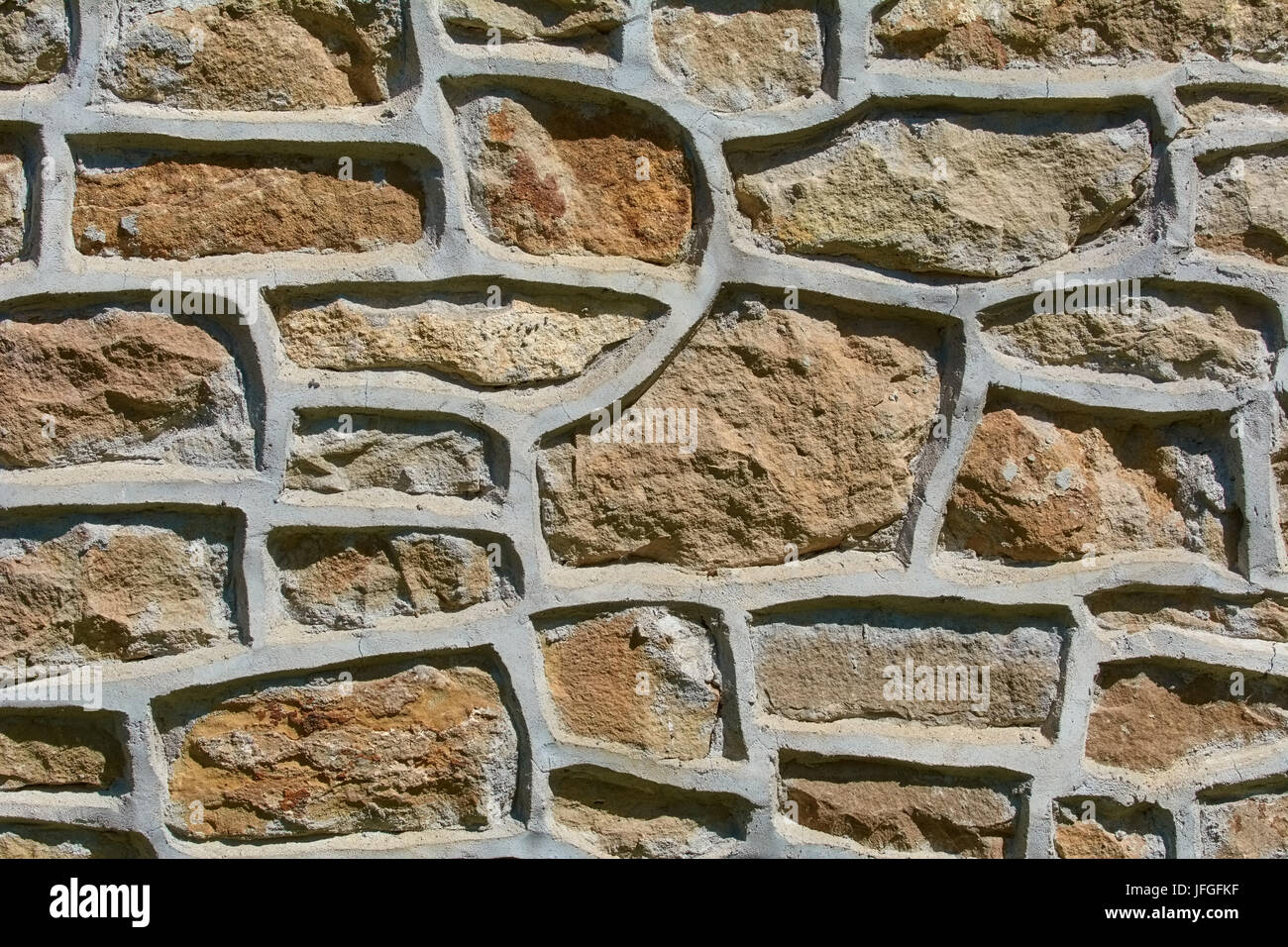 Muro di pietra sullo sfondo Foto Stock