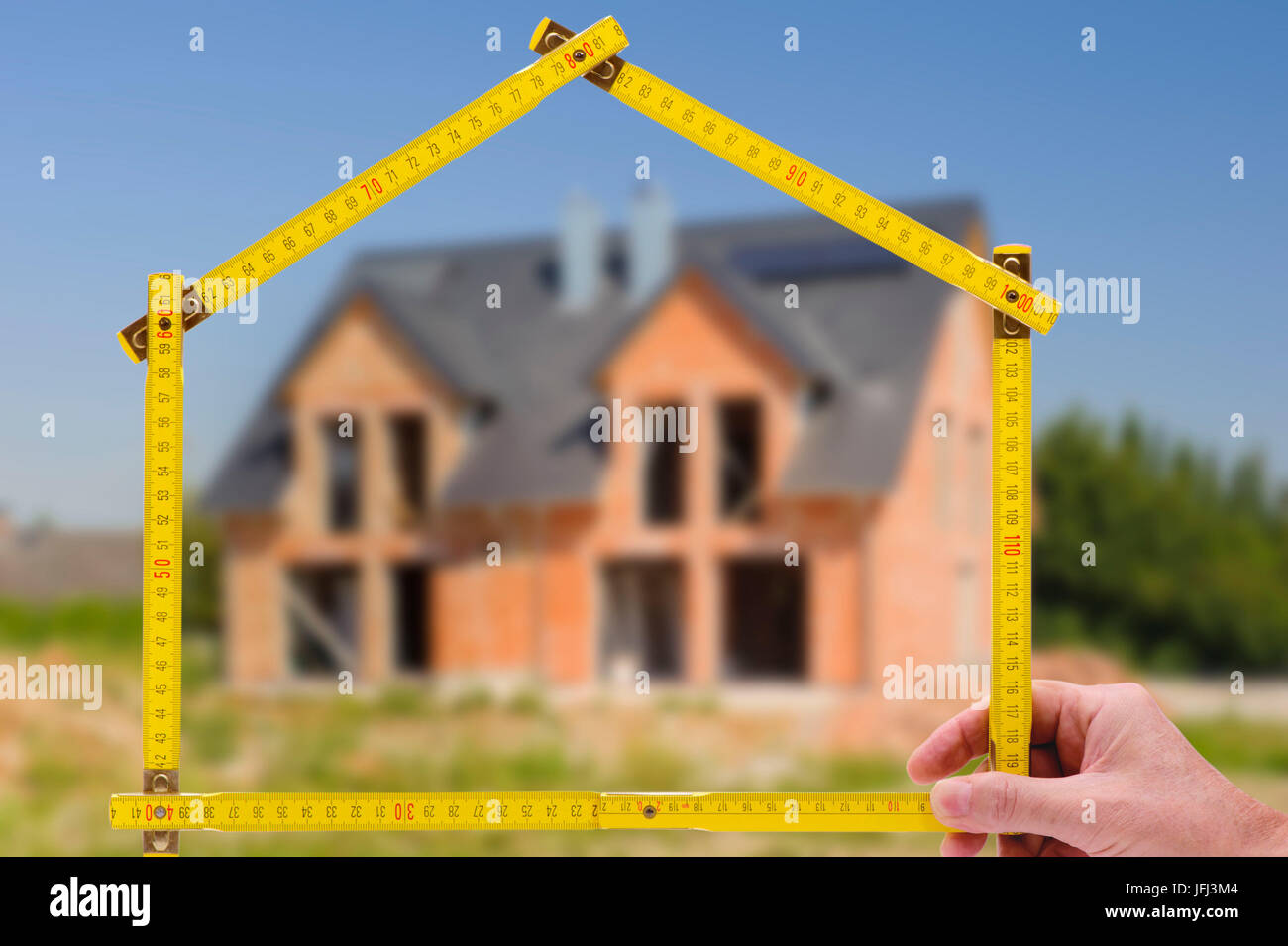 Acquisto di una casa con broker e il bastone cantiere Foto Stock