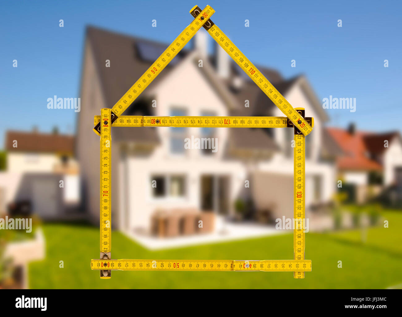 Costruzione di una casa e le vendite con il bastone cantiere come icona Foto Stock