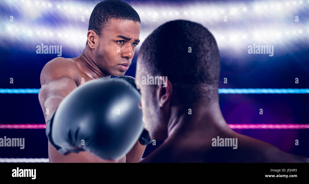 Immagine composita della vista posteriore del boxer in piedi Foto Stock