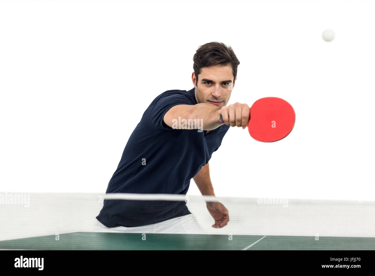 Ritratto di atleta maschio giocando a ping-pong Foto Stock