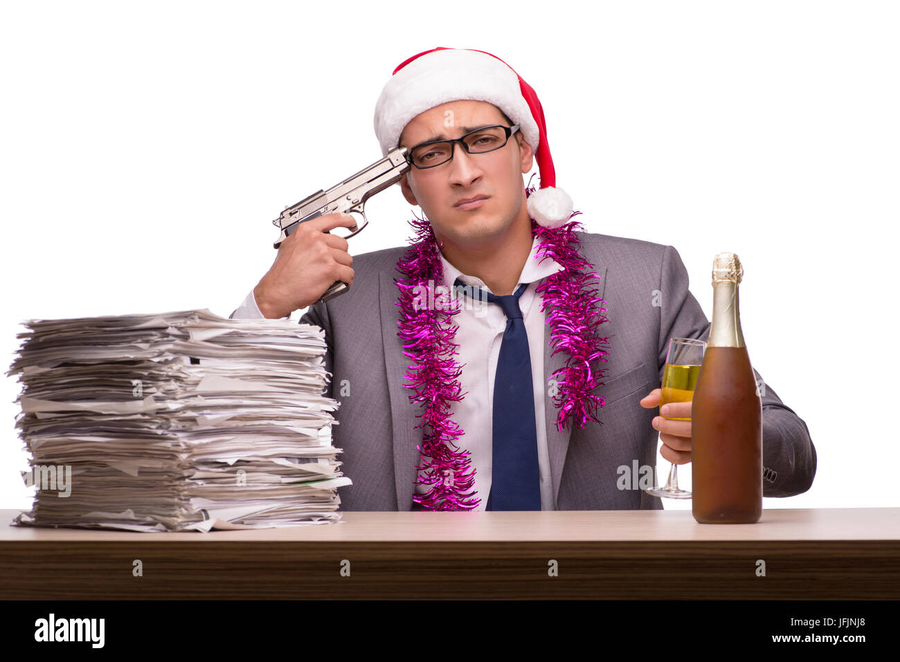 Giovane imprenditore per celebrare il Natale in ufficio Foto Stock