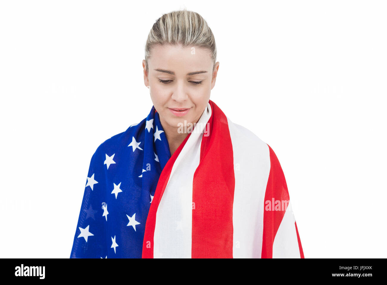 Atleta femminile con bandiera americana sulle sue spalle Foto Stock