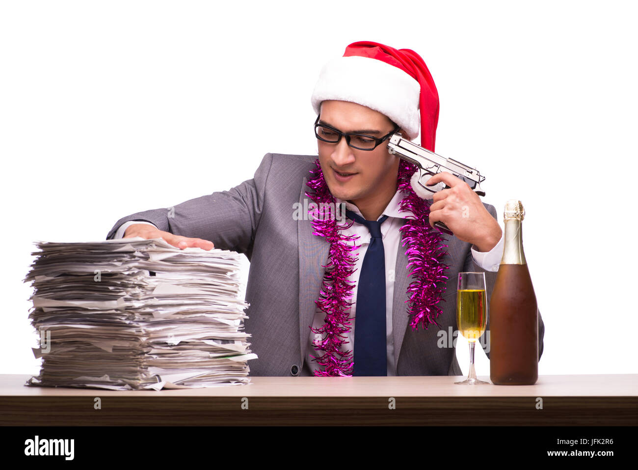 Giovane imprenditore per celebrare il Natale in ufficio Foto Stock