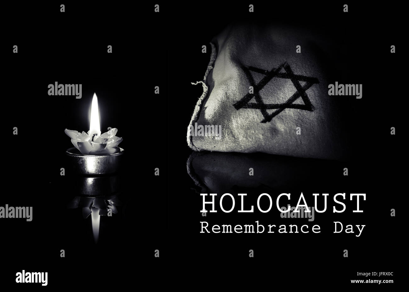 Candela che brucia e la stella di Davide contro uno sfondo nero, non dimenticheremo mai la Shoah ebraica e di eroismo. Olocausto Giorno del Ricordo 27 Foto Stock