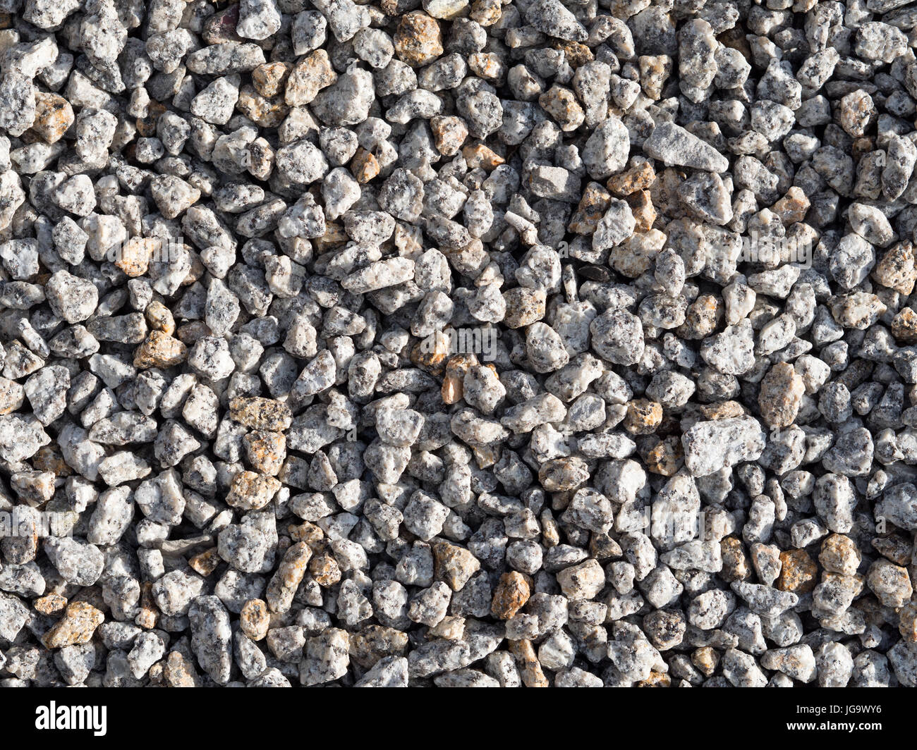 Un sacco di piccole pietre grigie close up texture. Foto Stock
