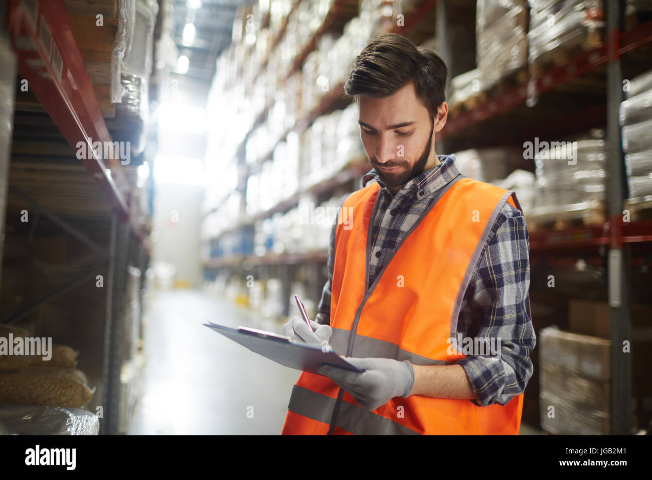 Lavorare in magazzino Foto Stock