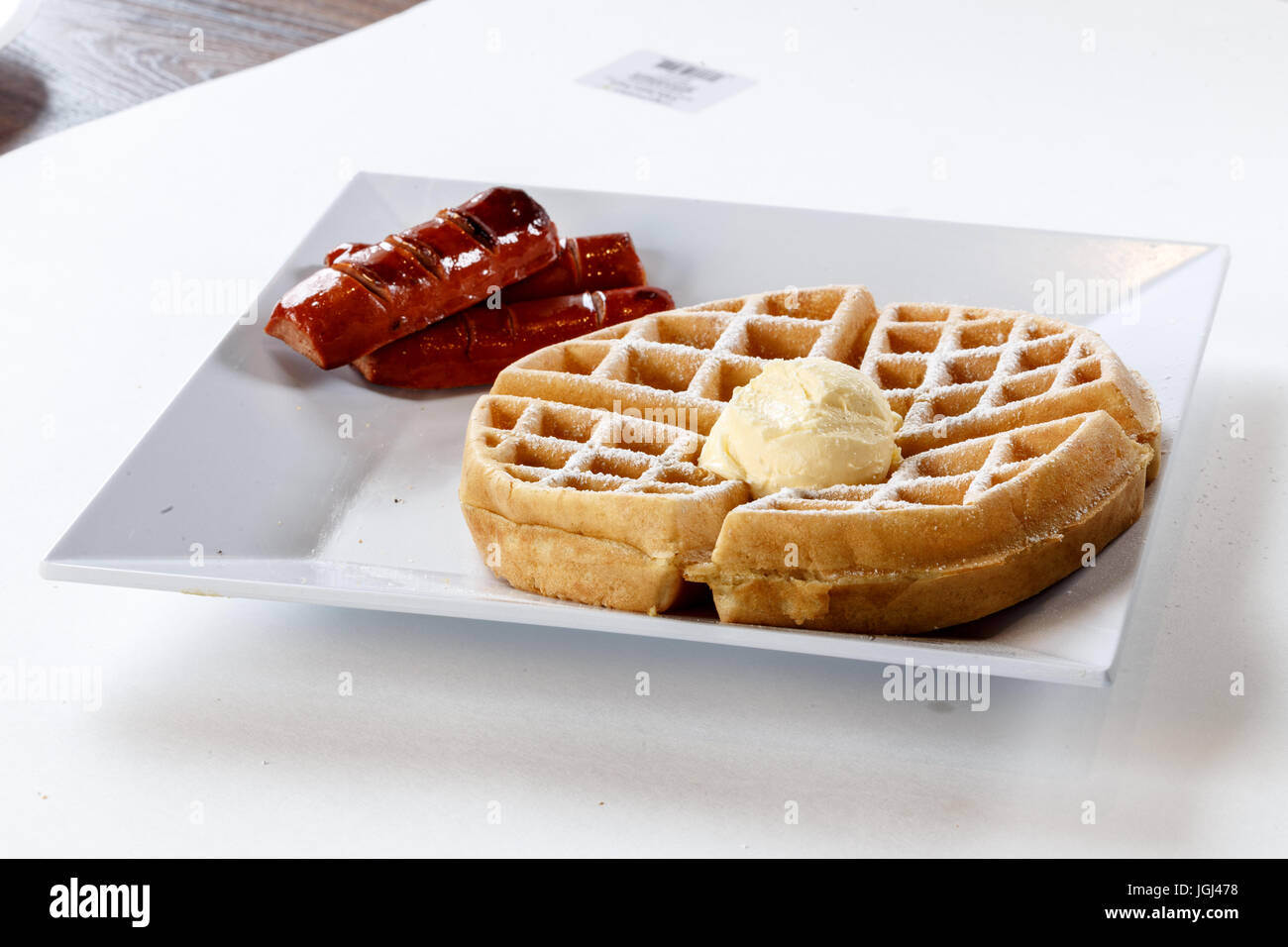 Waffle w/ Burro e salsiccia Foto Stock