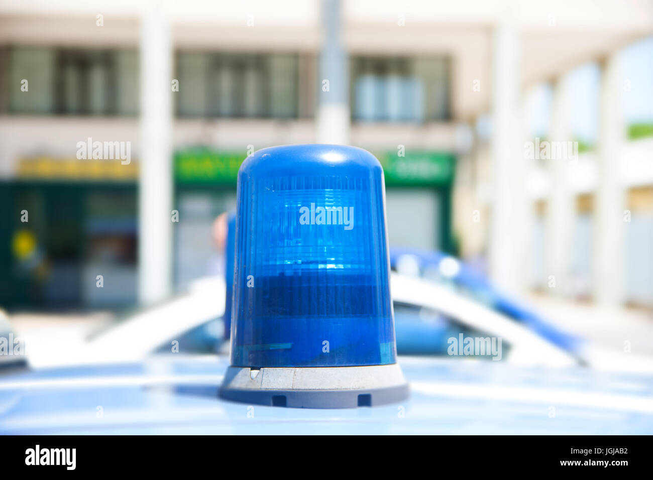 Sirena blu sulla parte superiore della macchina della polizia Foto stock -  Alamy