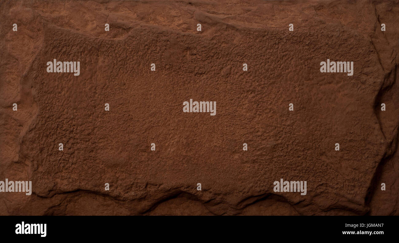 Pietra artificiale piastrella ruvida. Texture e background. Foto Stock