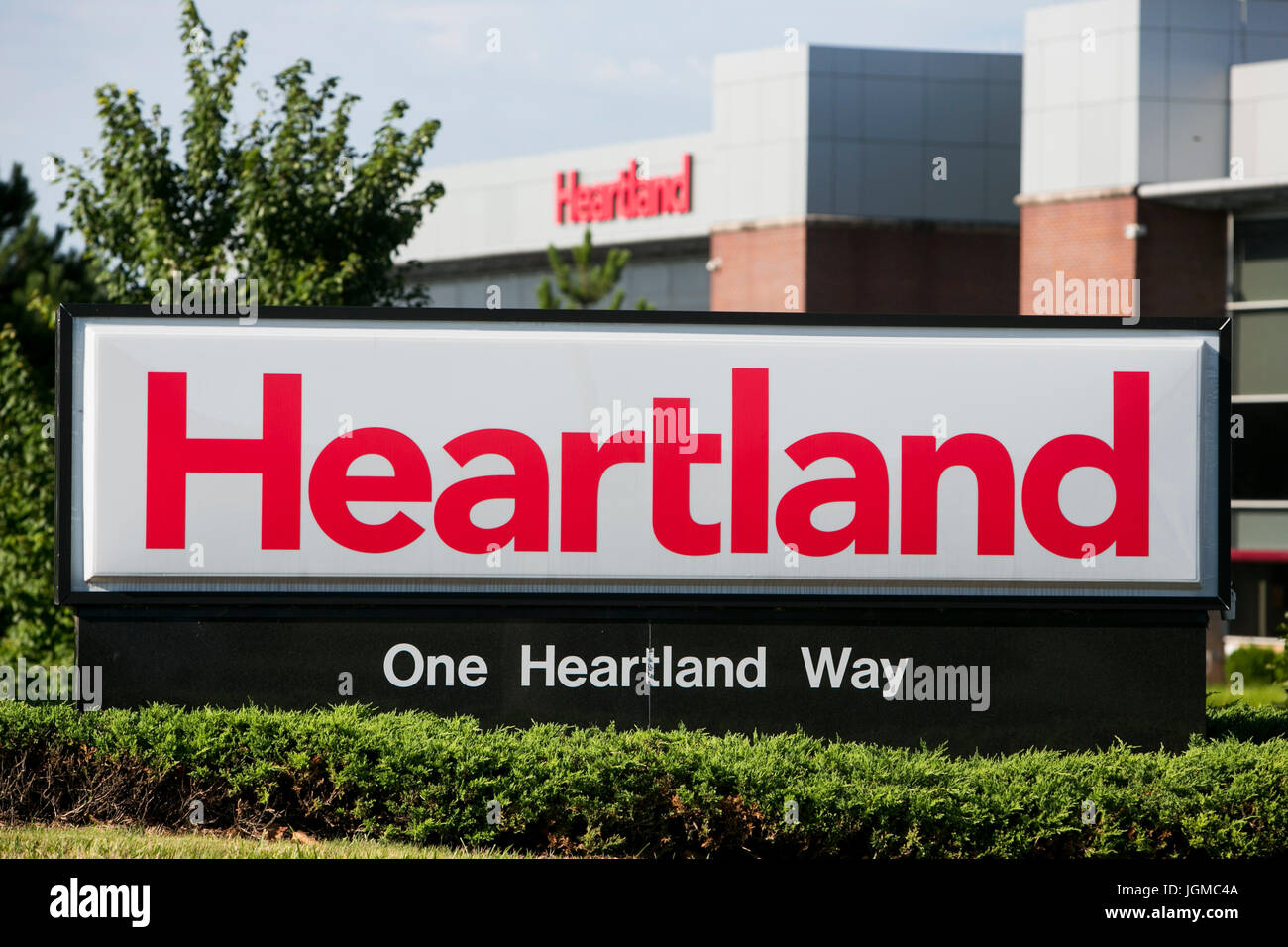 Un segno del logo al di fuori di una struttura occupata dal cuore dei sistemi di pagamento in Jeffersonville, Indiana il 1 luglio 2017. Foto Stock