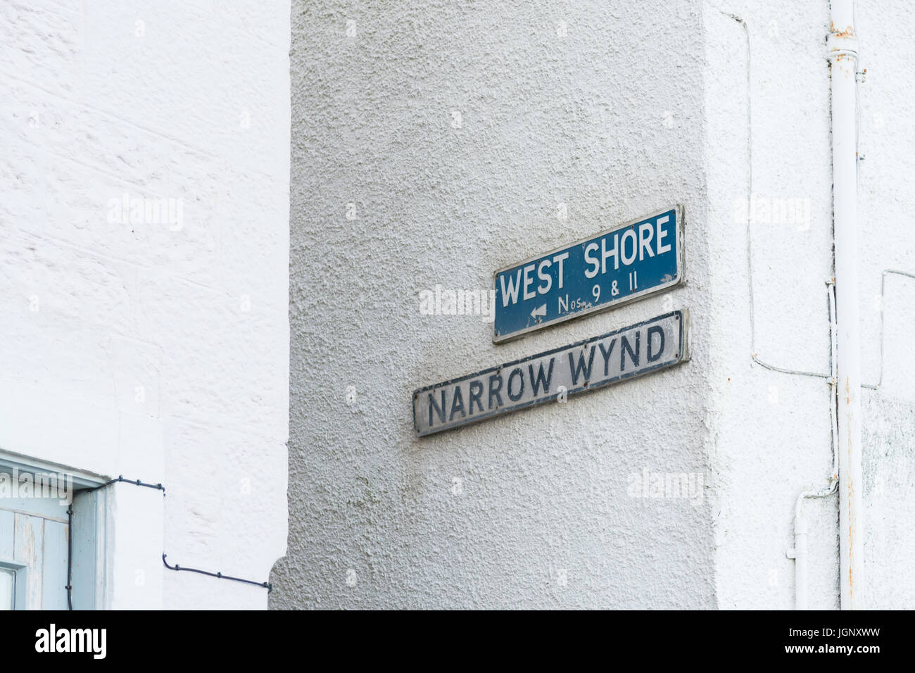 Wynd - una parola scozzese di una stretta viuzza o un vicolo - Stretto Wynd strada segno in St Monans villaggio di pescatori in Fife, Scozia, Regno Unito Foto Stock