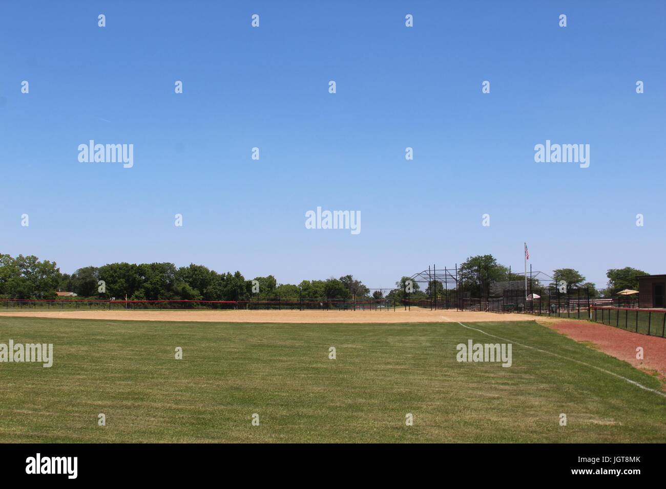 Il campo da baseball e i laghi del parco in un pomeriggio soleggiato giorno. Foto Stock