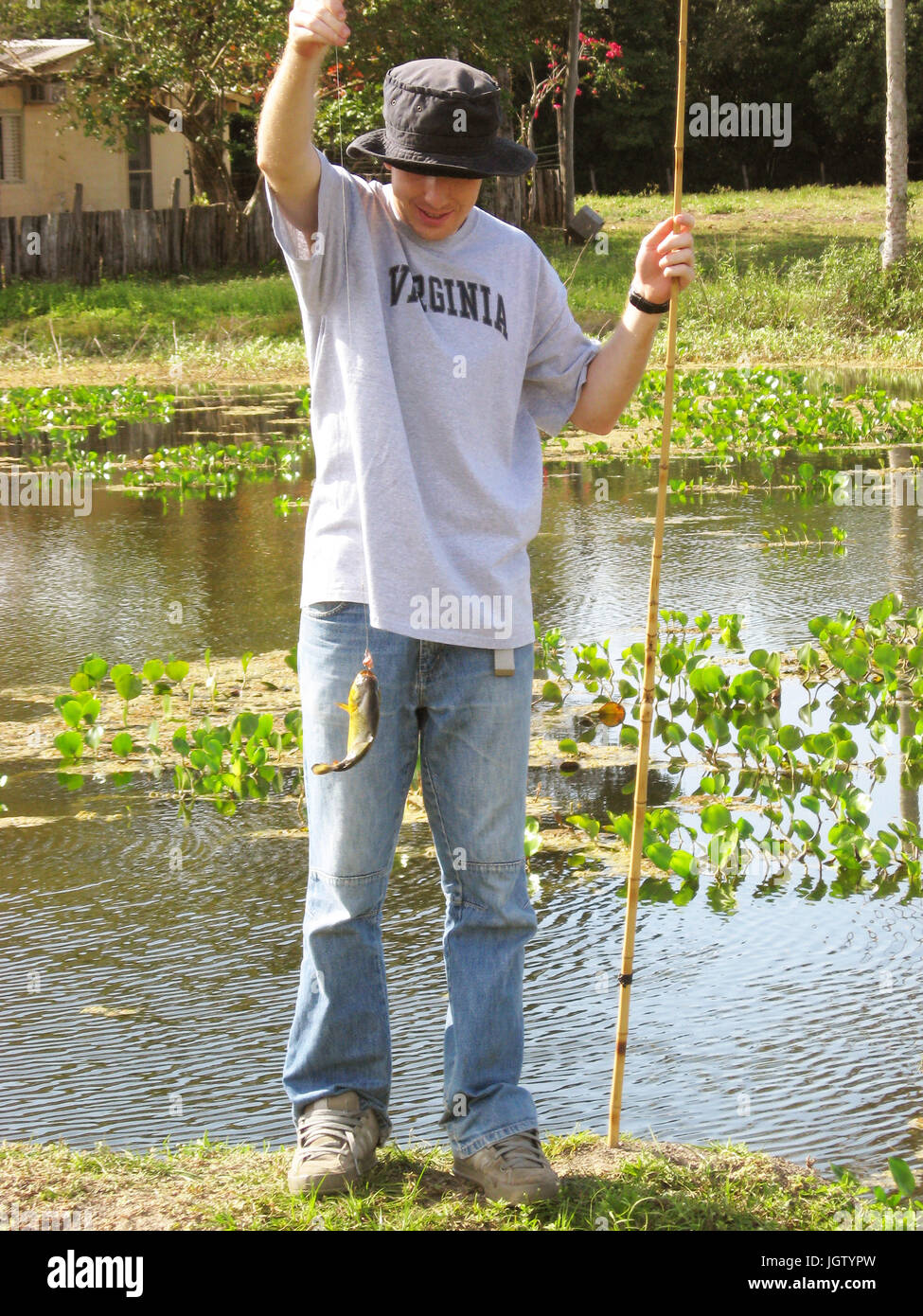 L'uomo la pesca, Pantanal, Mato Grosso do Sul, Brasile Foto Stock