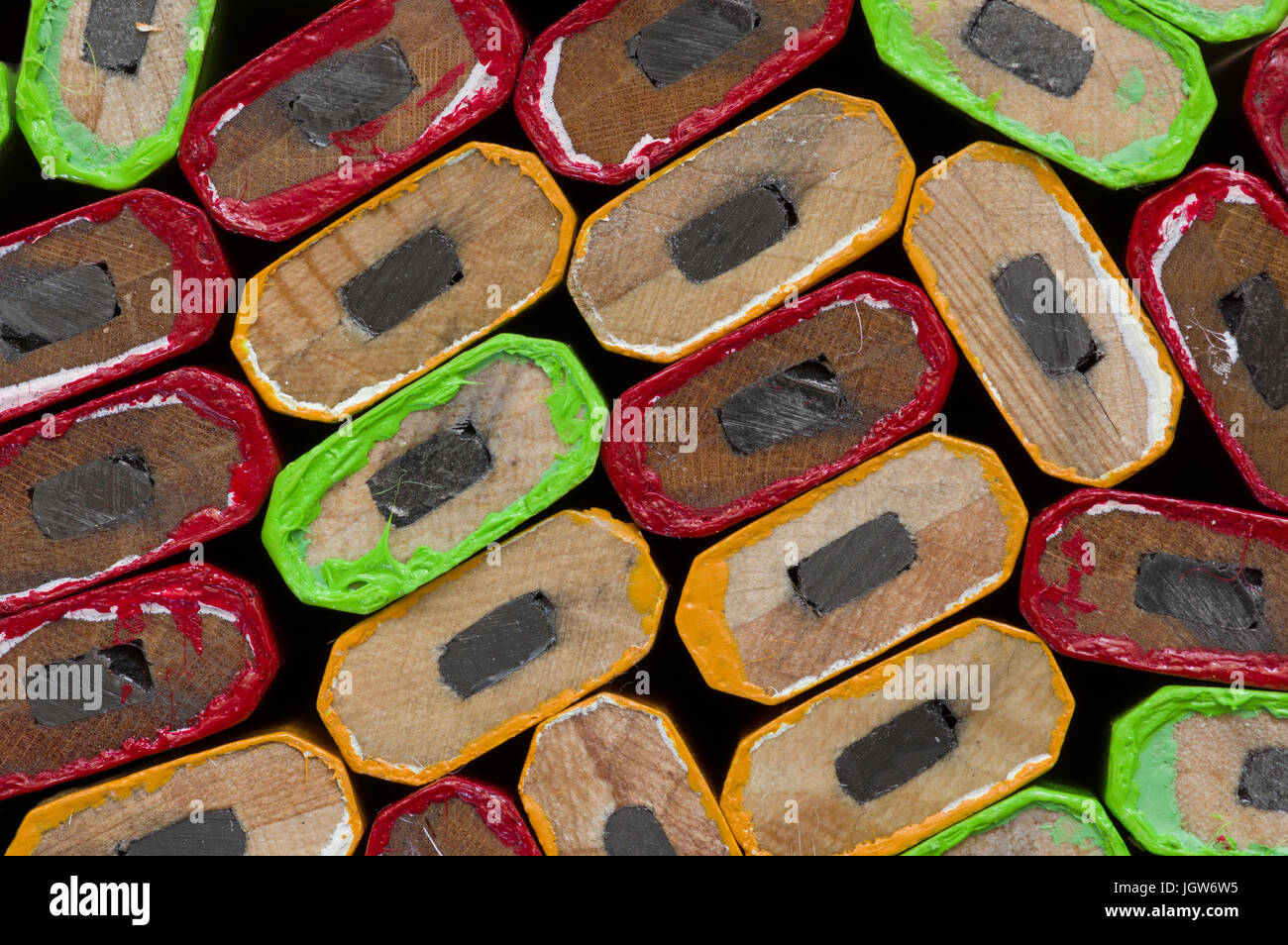 Colori misti falegname matita impilati estremità macro sfondo Foto Stock