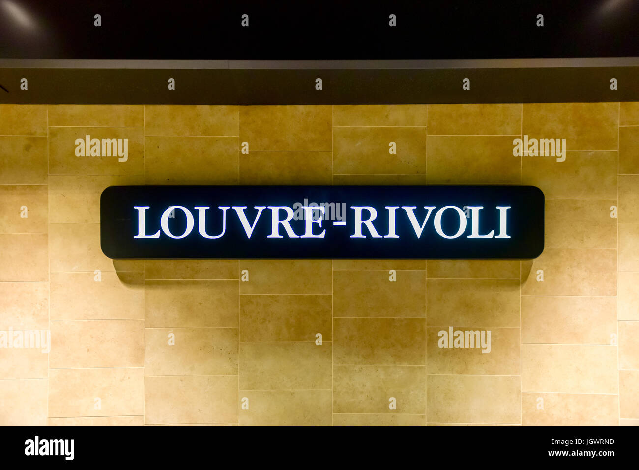 Segno del Louvre-Rivoli Stazione della metropolitana Parigina. Foto Stock