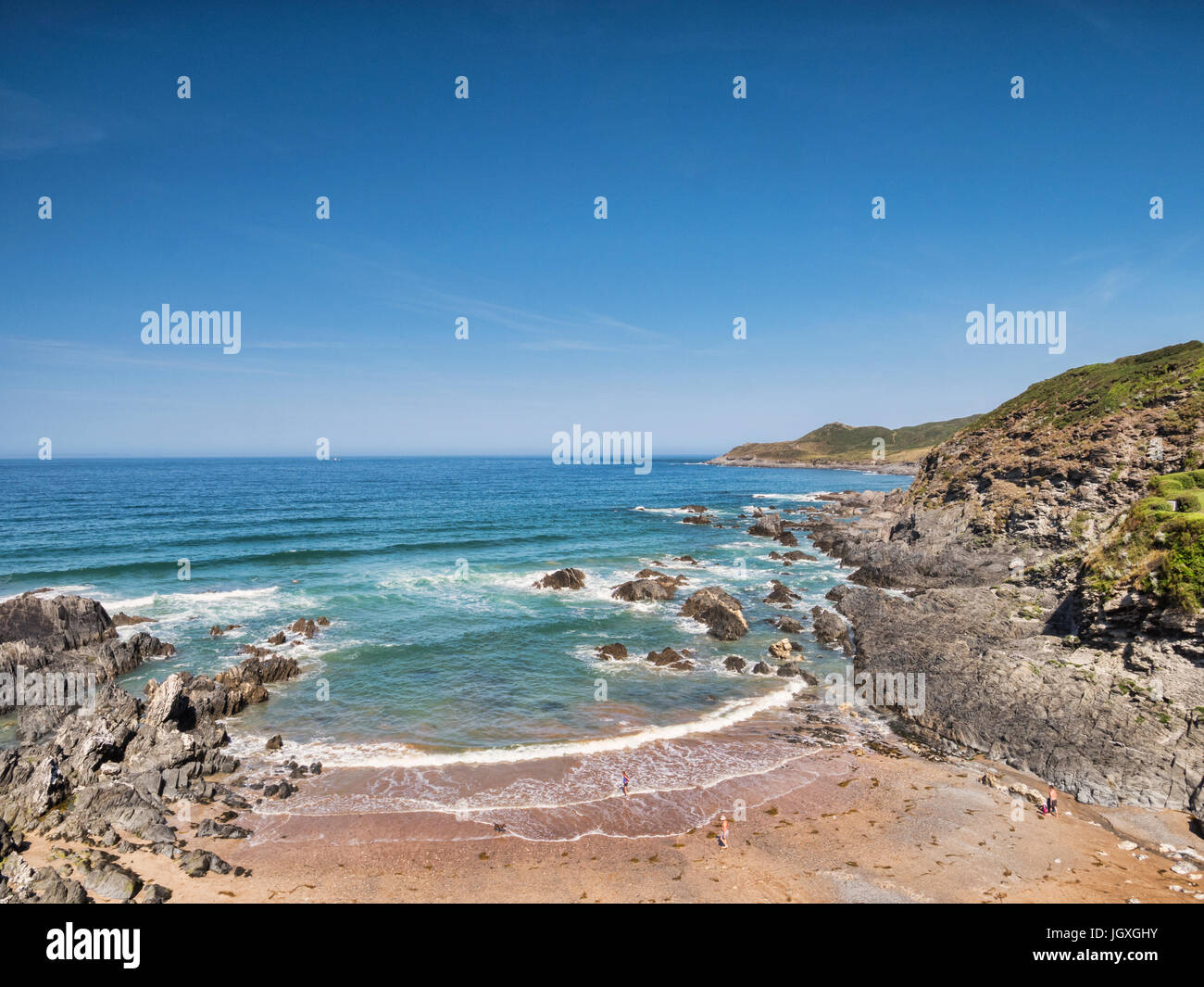 Combesgate Beach, Woolacombe, North Devon, Inghilterra, Regno Unito, su uno dei giorni più caldi dell'anno. Foto Stock