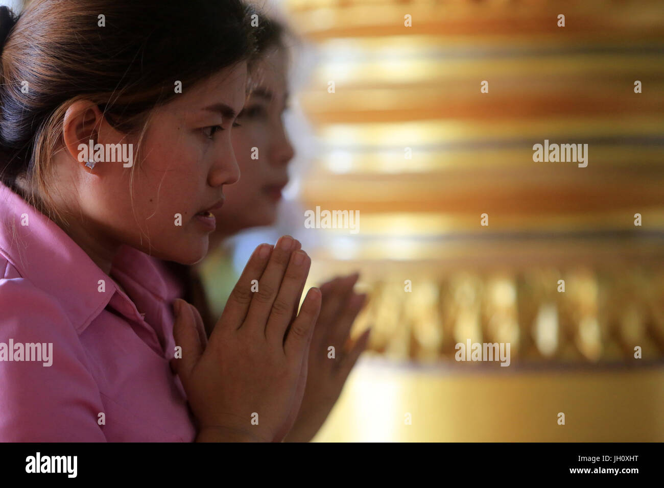 Cerimonia buddista. Wat Ongs Teu Mahawihan. Tempio del Buddha di pesanti. Vientiane. Laos. Foto Stock