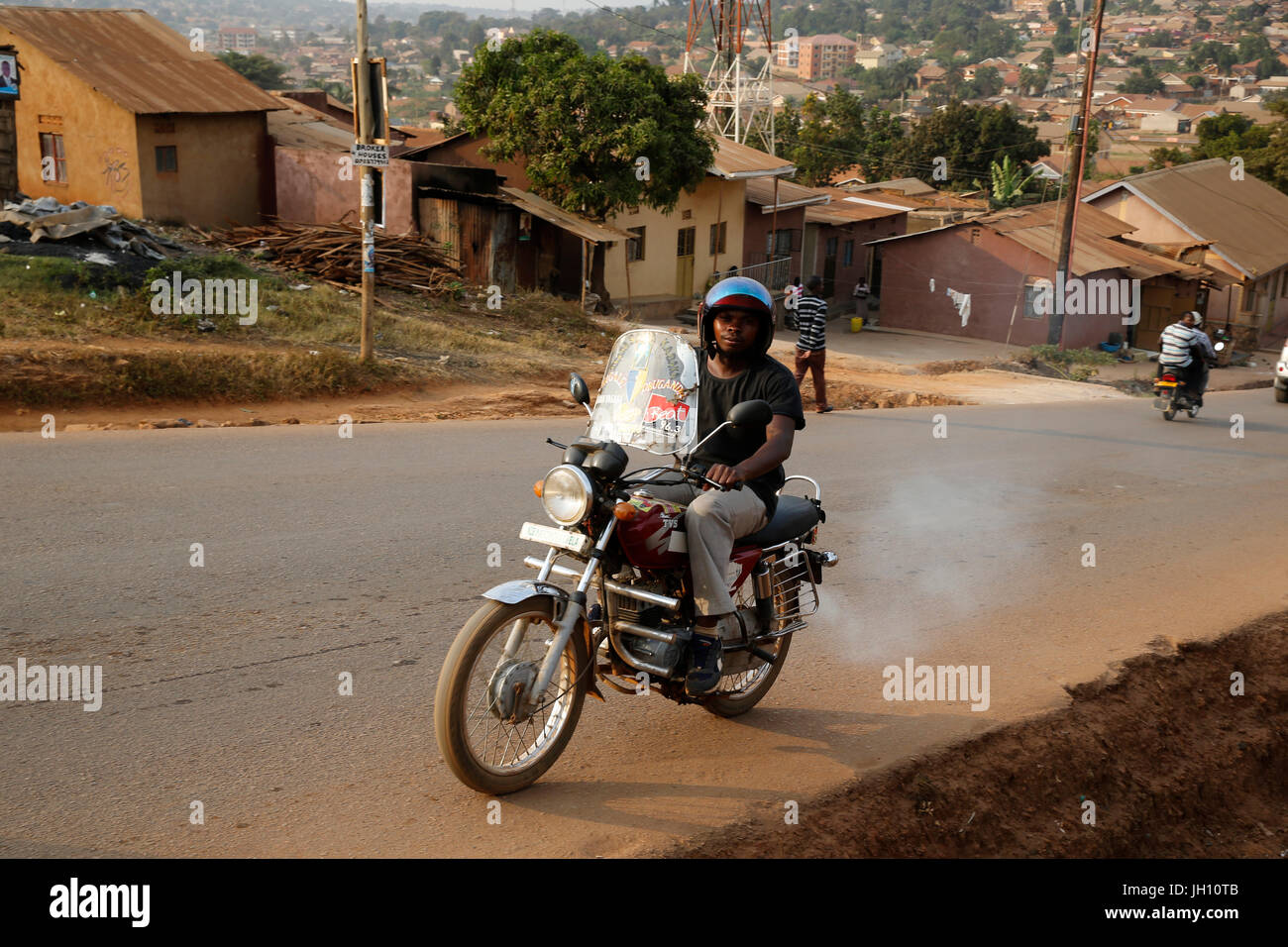 Boda boda motociclo taxi a Mulago di Kampala. Uganda. Foto Stock