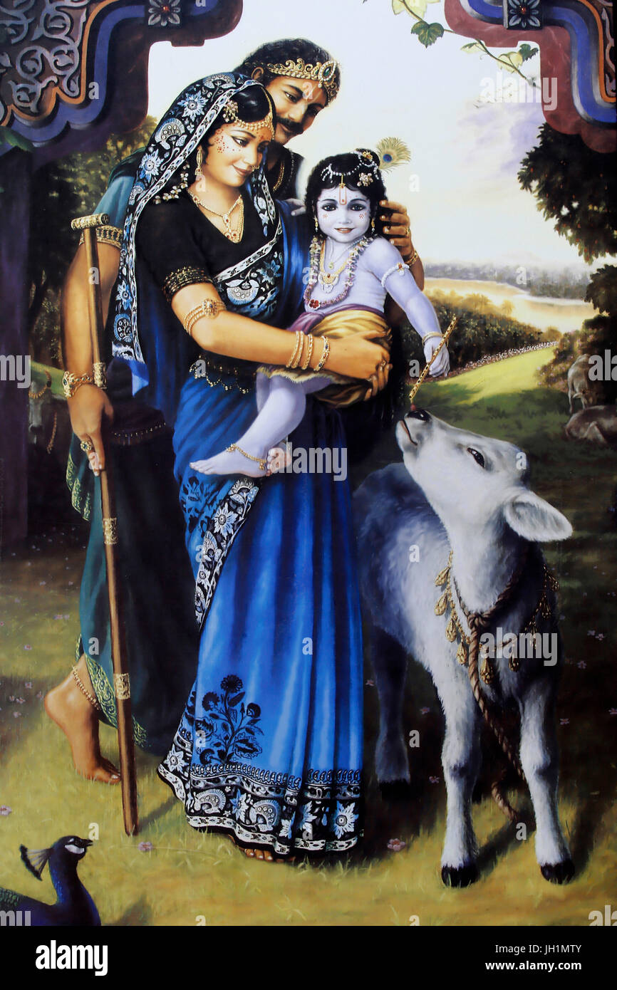 Dipinto raffigurante il dio Hindu Krishna come un bambino con il suo favorire i genitori Yashoda & Nanda. India. Foto Stock