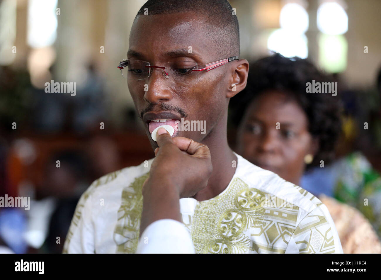 Domenica mattina catholic mass. Lomé. Il Togo. Foto Stock