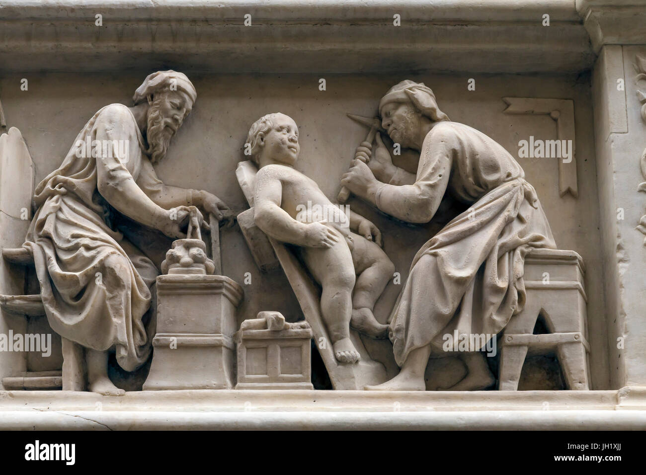 Orsanmichele sculture a parete, la corporazione dei muratori, Firenze Italia Europa Foto Stock