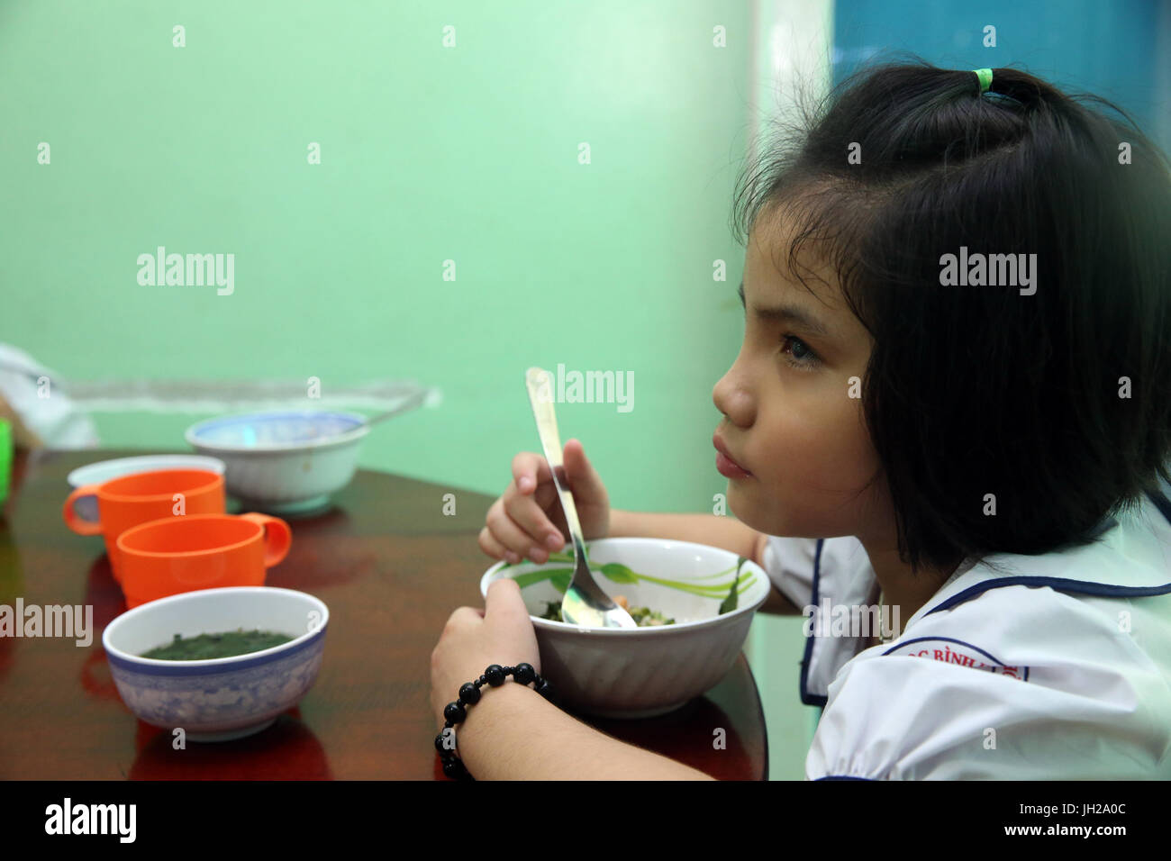 Il Vietnam. Centro per i bambini ciechi. Il pranzo. Foto Stock