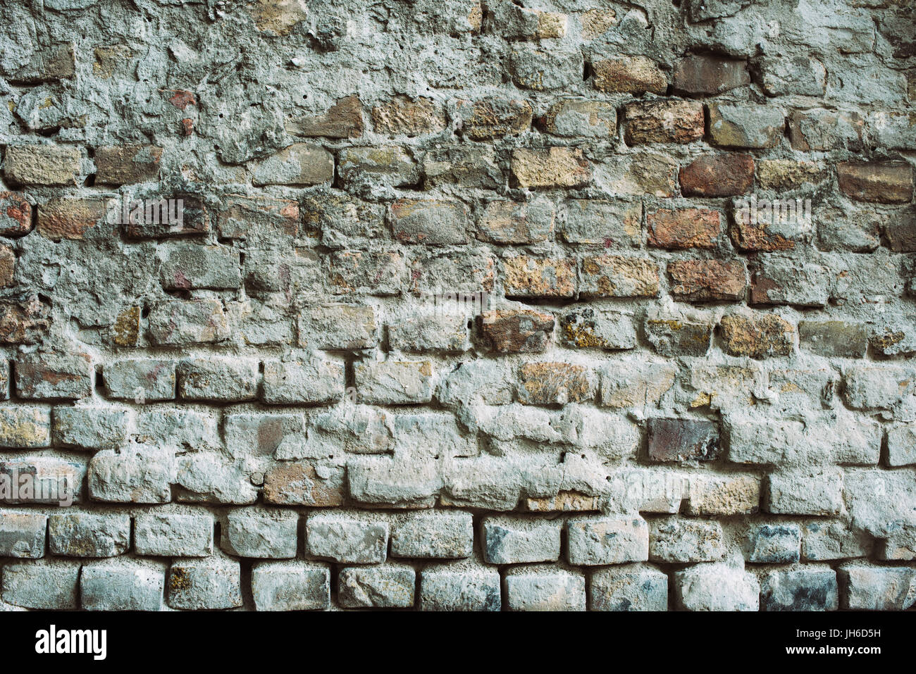 Weathered muro di mattoni, vecchio edificio esterno superficie brickwall Foto Stock