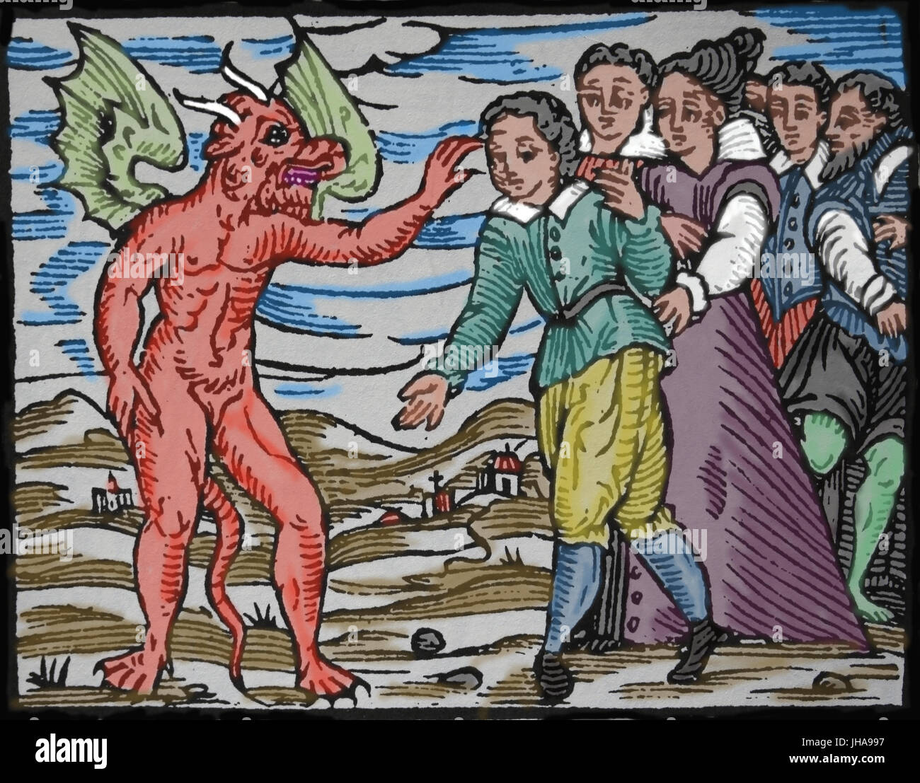 Satana applicando il suo marchio ad artiglio per un apprendista stregone. Incisione, secolo XVII. Foto Stock