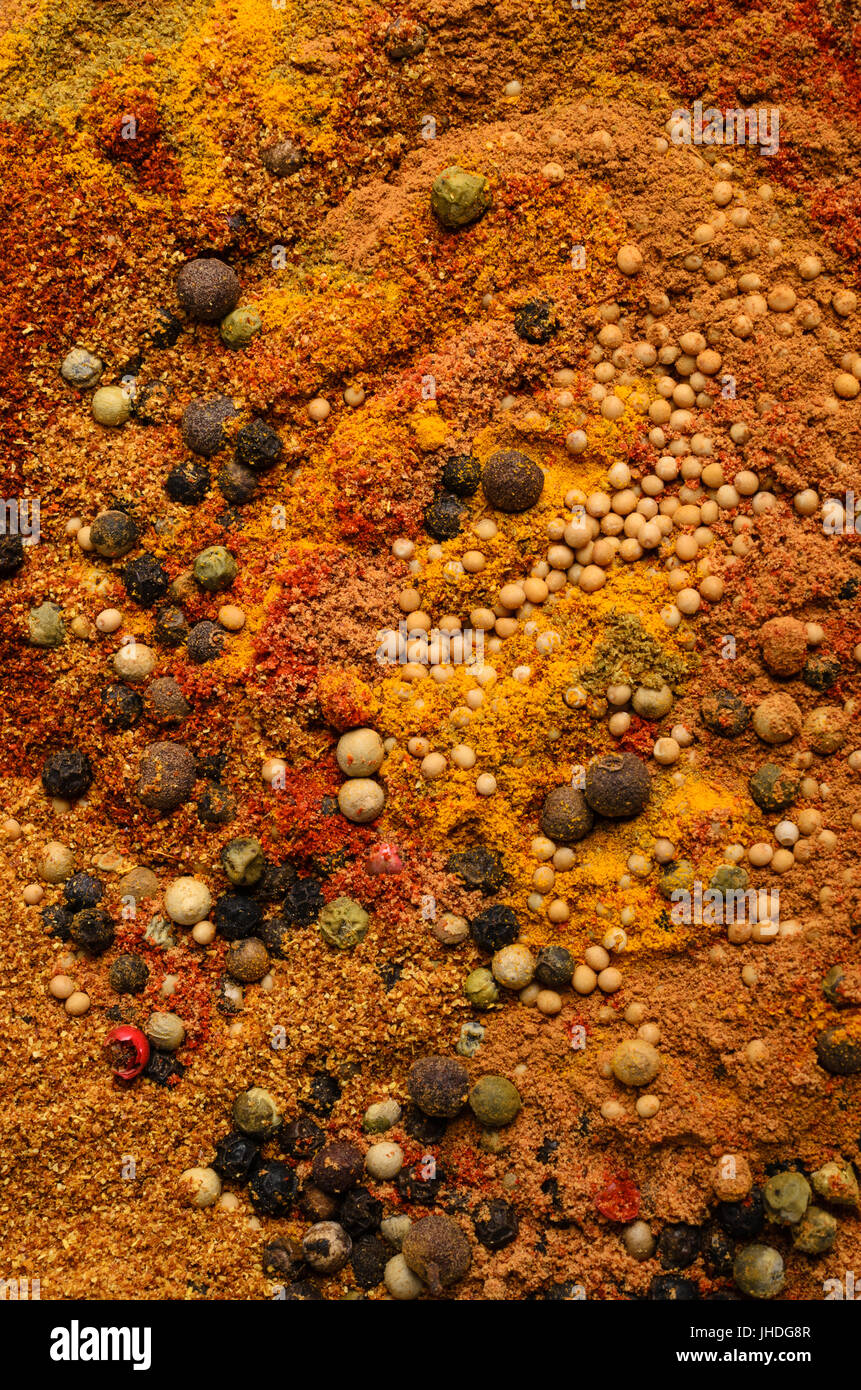 Abstract food texture realizzata da una ampia varietà di spezie in semi e in polvere. Foto Stock