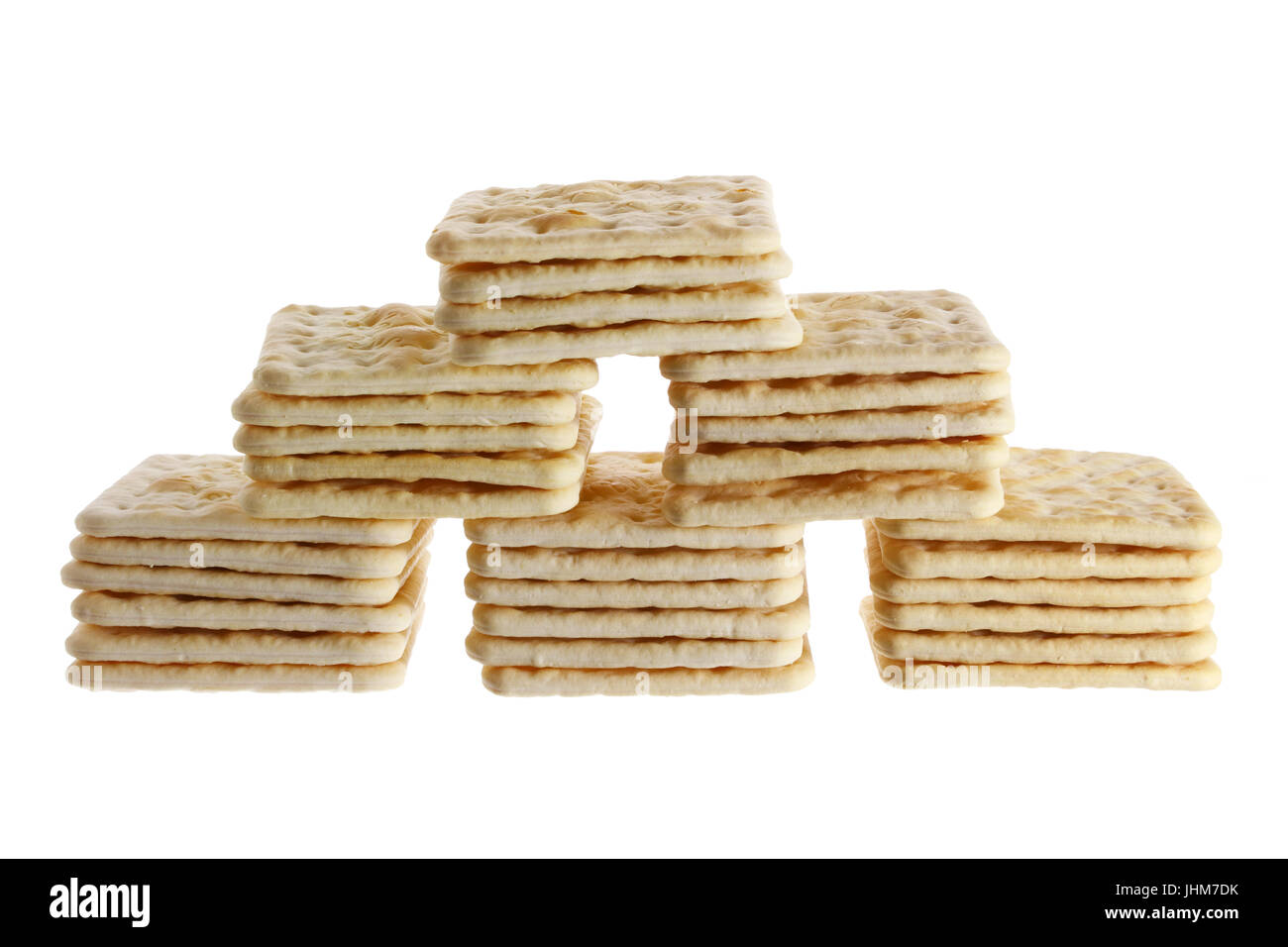 Pile di cracker su sfondo bianco Foto Stock