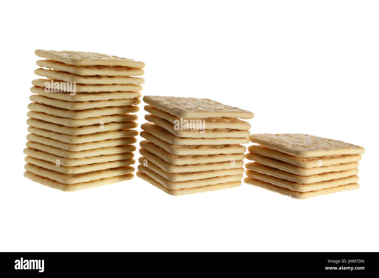 Pile di cracker su sfondo bianco Foto Stock