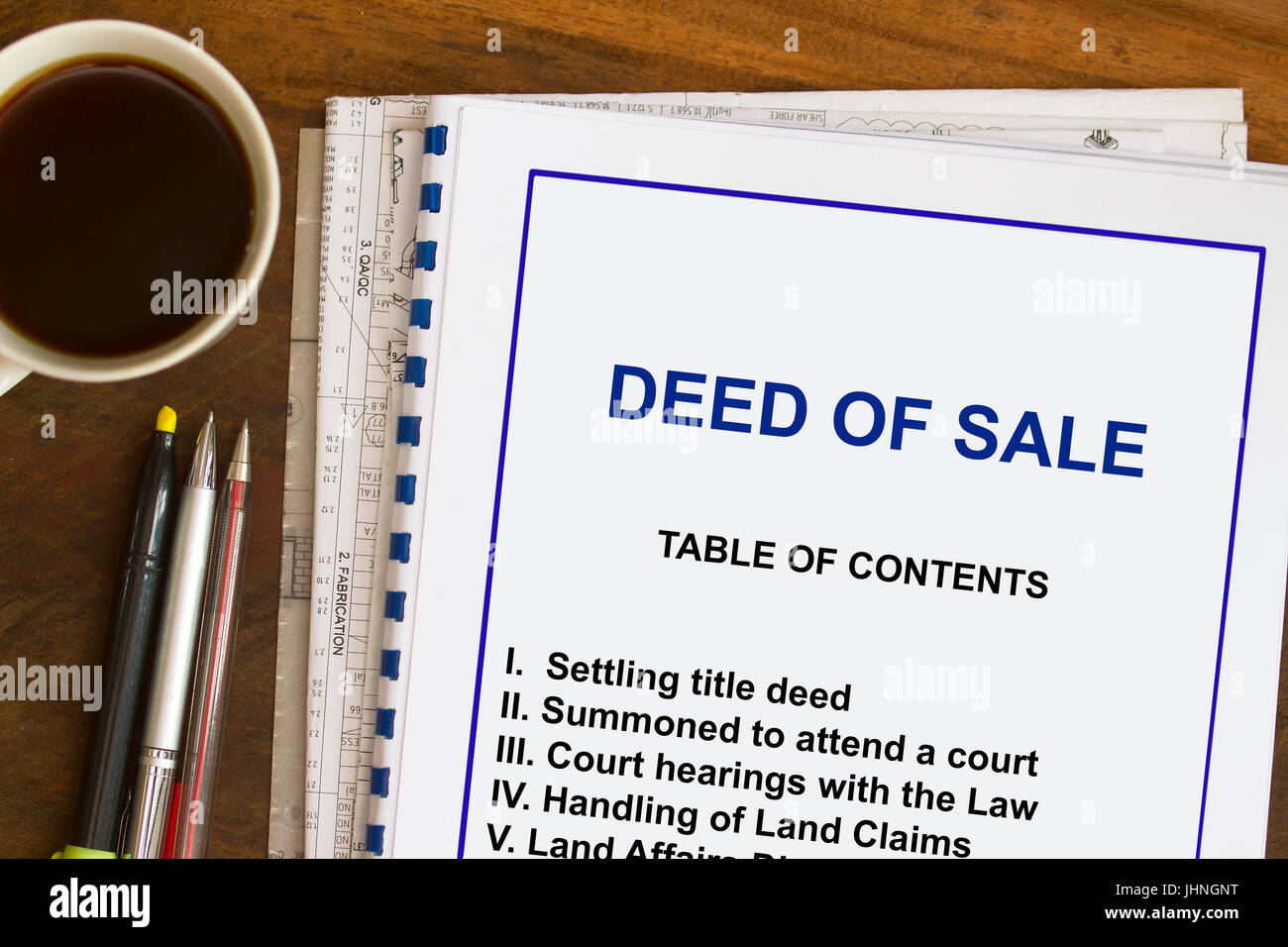 Atto di vendita concetto- Lecture Notes sull'acquisto di terreni. Foto Stock