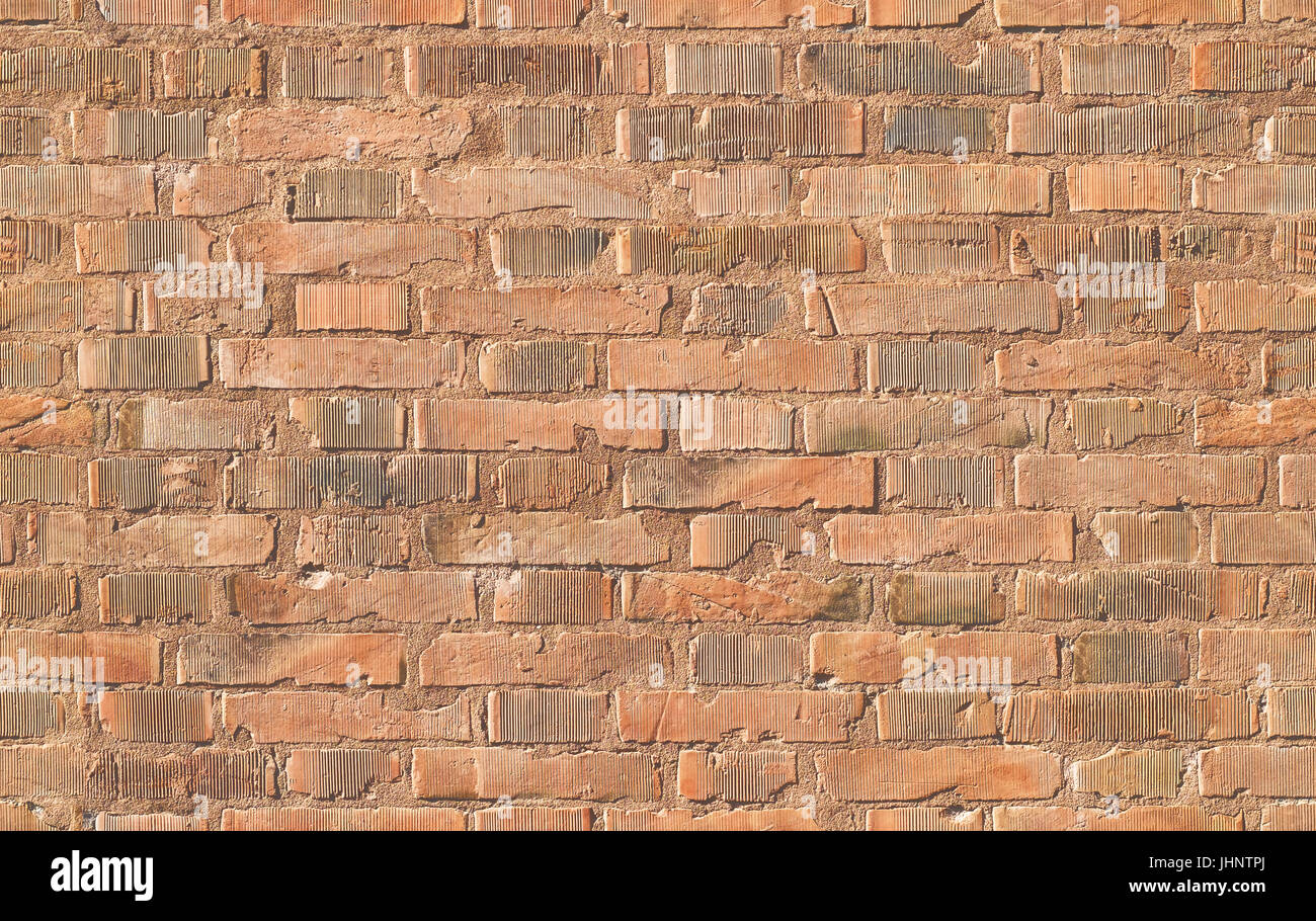 Reale senza giunture perfette muro in mattoni pattern sfondo. Leggermente dissaturata, ottimale per graffiti mockup. Foto Stock
