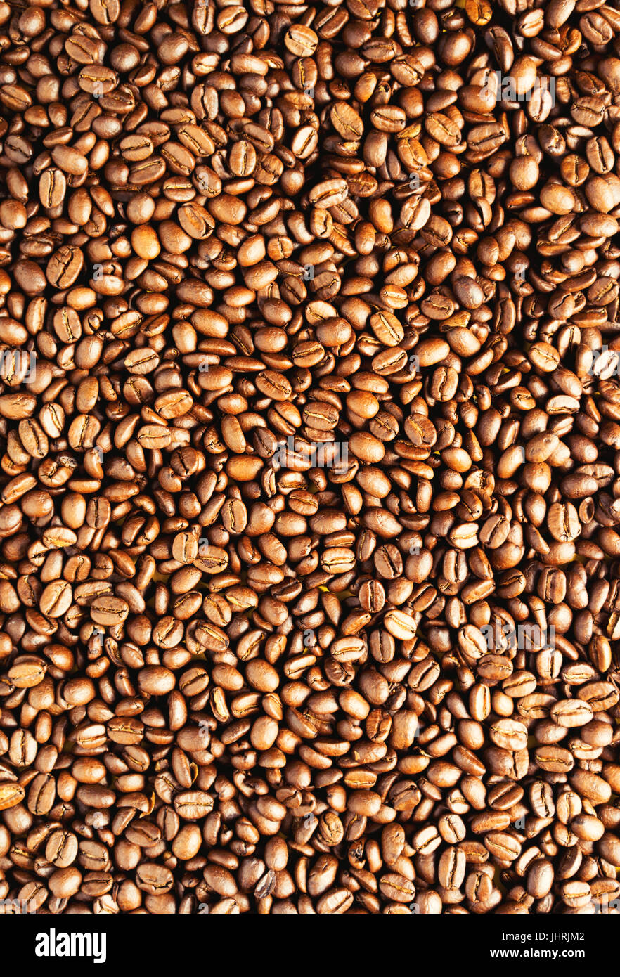 Chicco di caffè sfondo. Chicchi di caffè tostati sfondo. Foto Stock