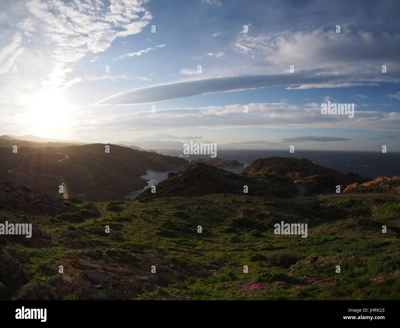 Sun impostazione sulla colline di spagnolo Foto Stock