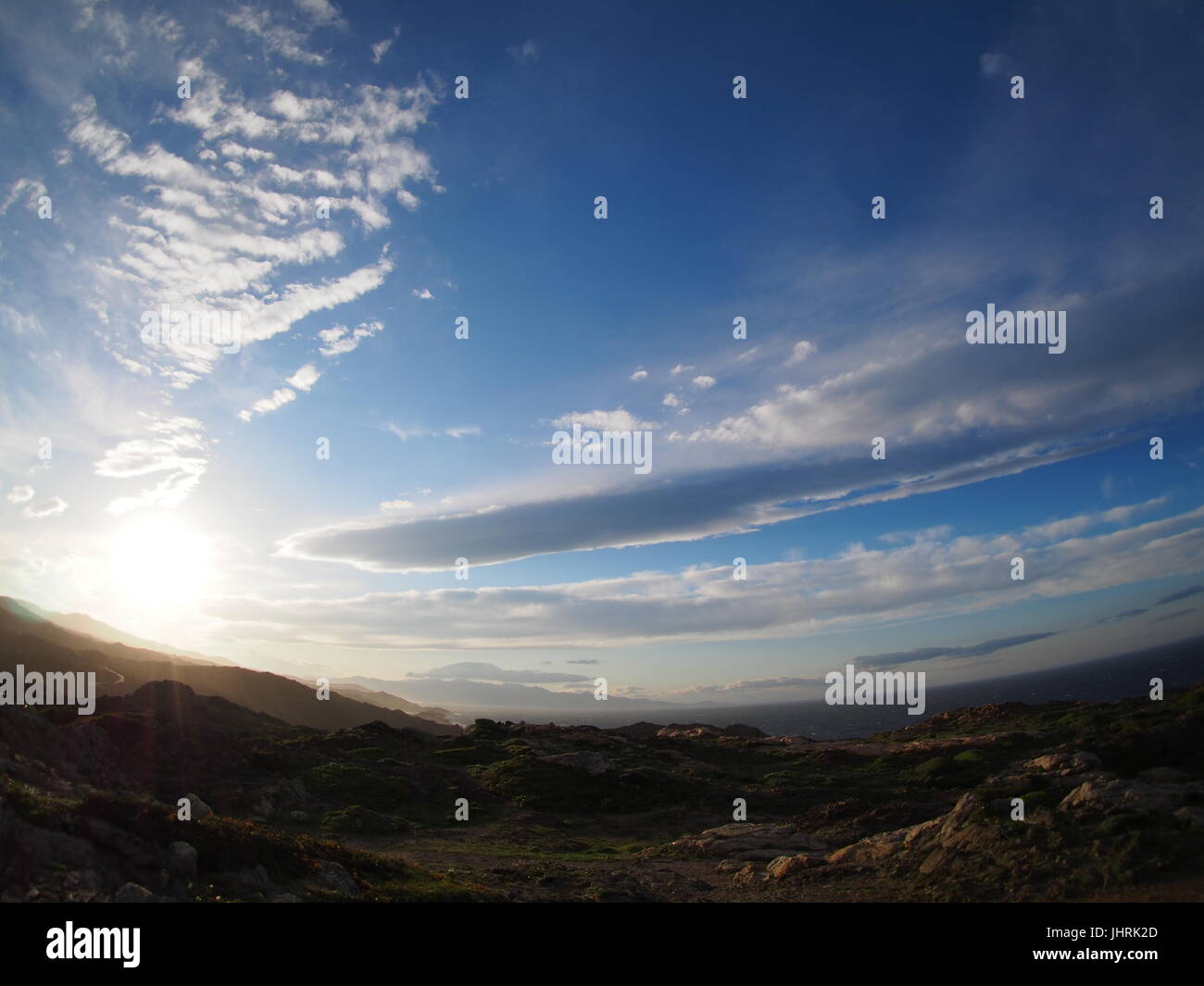 Sun impostazione sulla colline di spagnolo Foto Stock