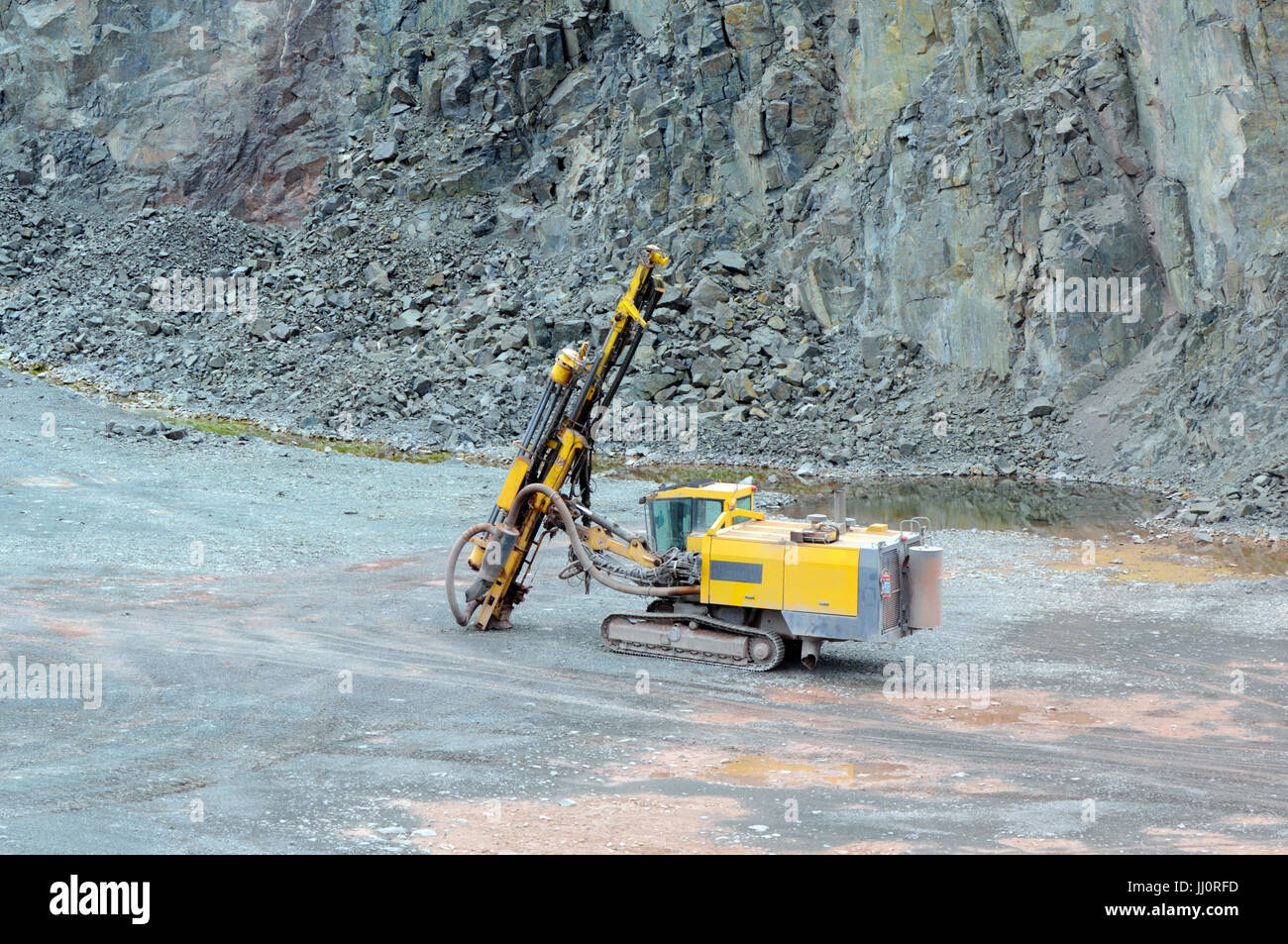 Perforatore in una cava miniera. industria mineraria. Foto Stock