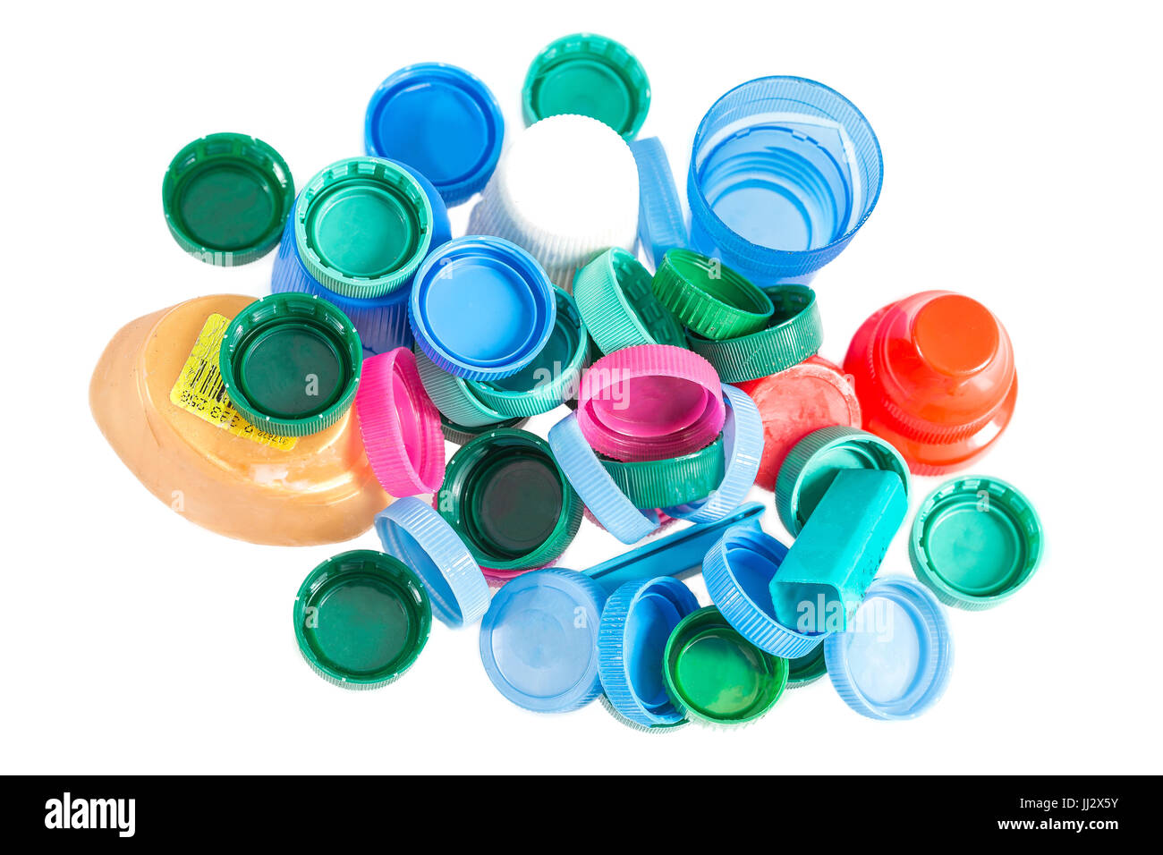 Raccolta di molti tappi di plastica per il riciclaggio su bianco Foto Stock Raccolta di molti tappi di plastica per il riciclaggio su bianco Foto Stock