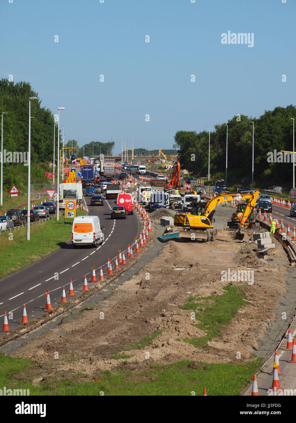 Newcastle Upon Tyne, 18 luglio 2017, UK Meteo. Il bel tempo per strada principale improvemnts sulla A 19 Tyne Tunnel/1058 coast road giunzione in North Tyneside. Costo fra £66-85 milioni con una parte superiore verso il basso la costruzione tecnica utilizzata per il 1058 coast road cavalcavia autostradale a distanza in un efford per ridurre conjestion e aumentare la capacità di traffico e di tempi di viaggio nel nord Easti di Inghilterra.. Foto Stock