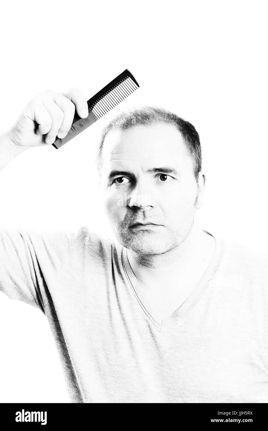 Uomo di mezza età interessate dalla perdita di capelli bald calvizie alopecia in bianco e nero Foto Stock
