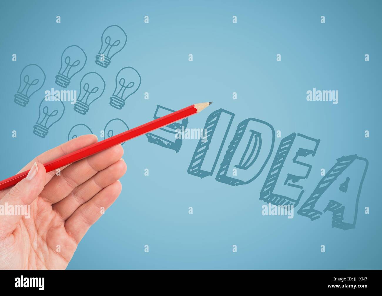 Mano con matita rossa rivolta a idea doodle contro sfondo blu Foto Stock